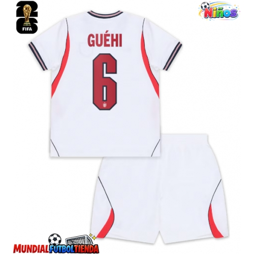 Camiseta Inglaterra Marc Guehi #6 Primera Equipación Replica Mundial 2026 para niños mangas cortas (+ Pantalones cortos)